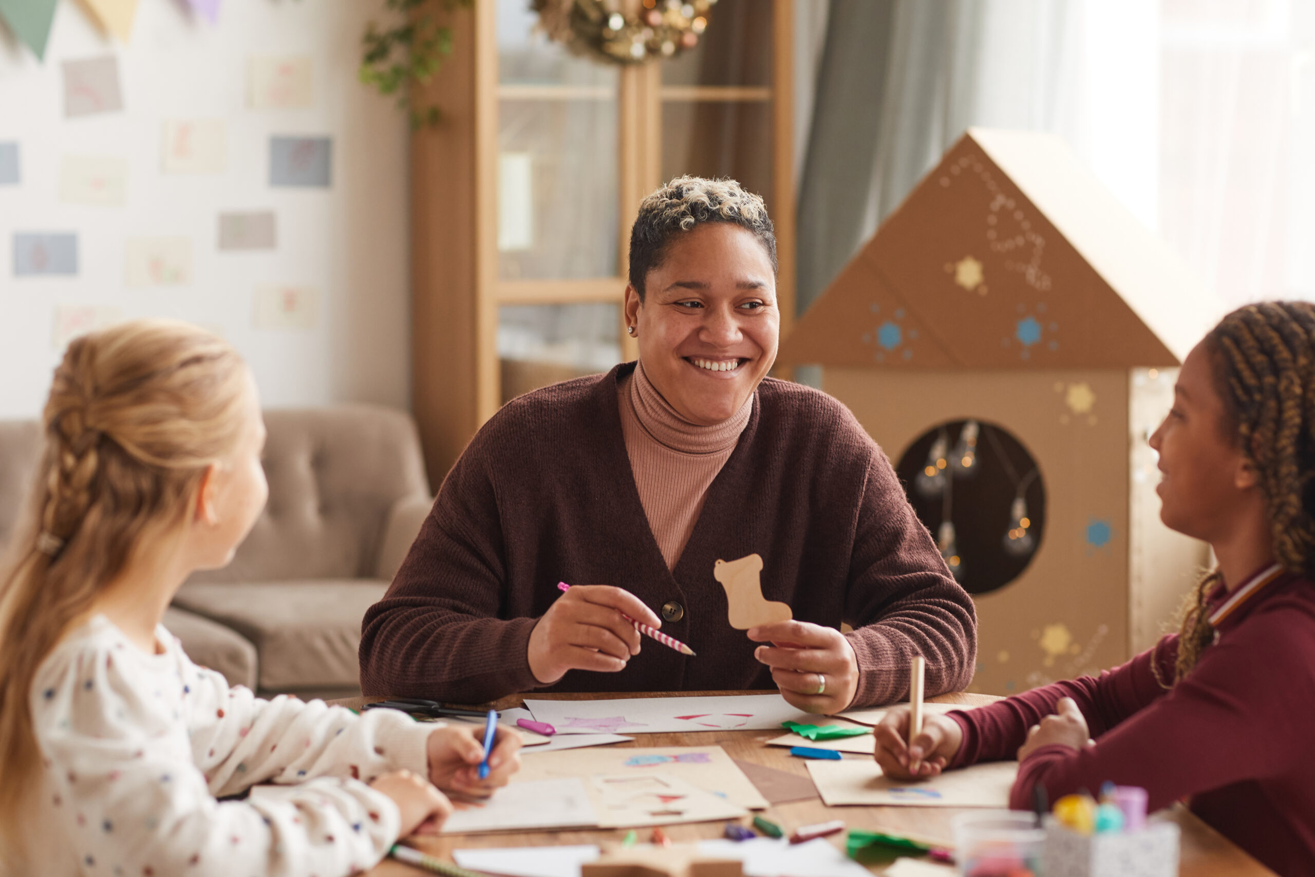 Smiling Female Teacher in Art Class
